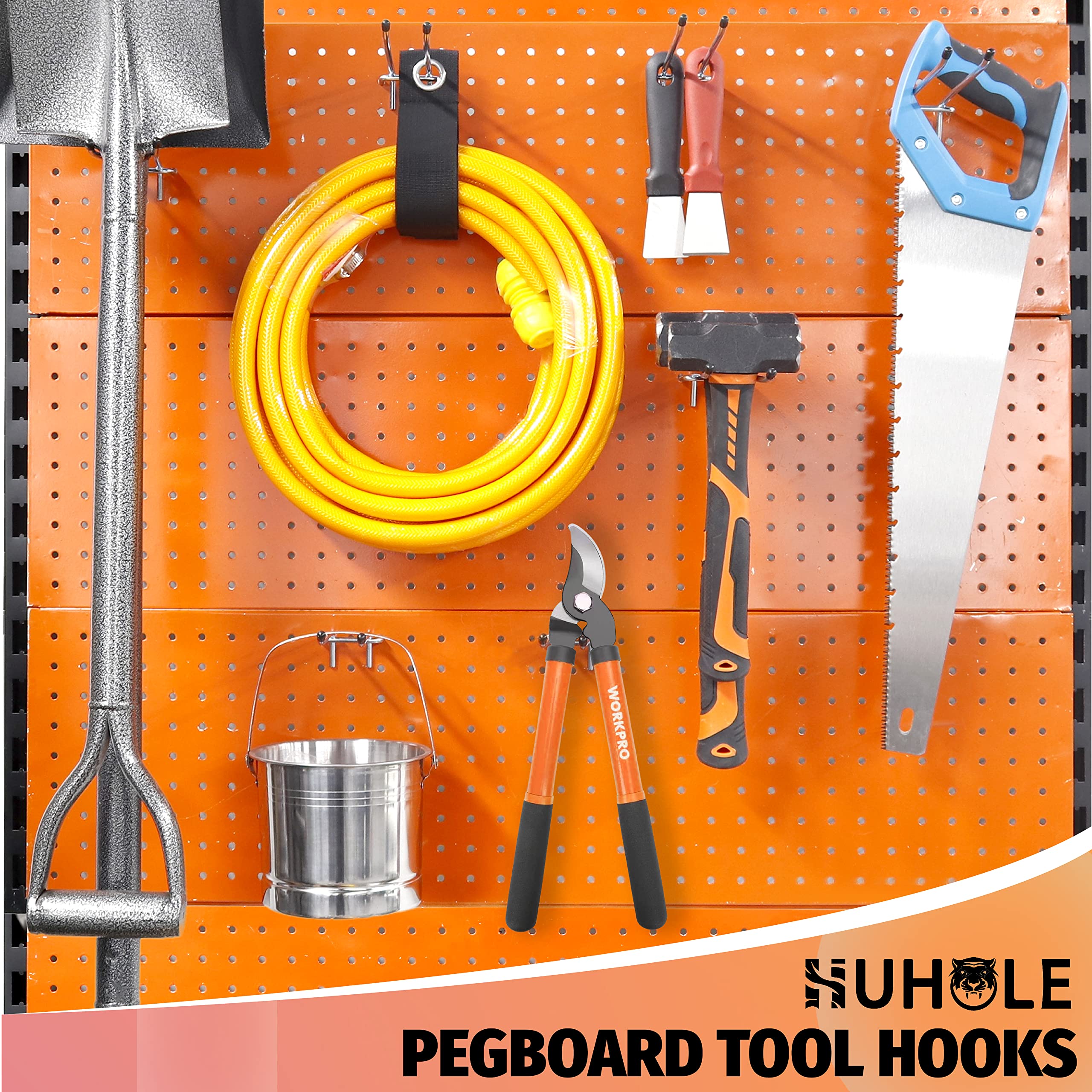 This image showcases a variety of Huhole-branded pegboard tool hooks and accessories for organizing a garage or workshop space. The pegboard display features a coiled yellow hose, hand tools, and other equipment securely mounted on the hooks. The prominent "Huhole" branding and the "Click to set focal point" overlay emphasize the high-quality, versatile nature of these pegboard storage solutions.