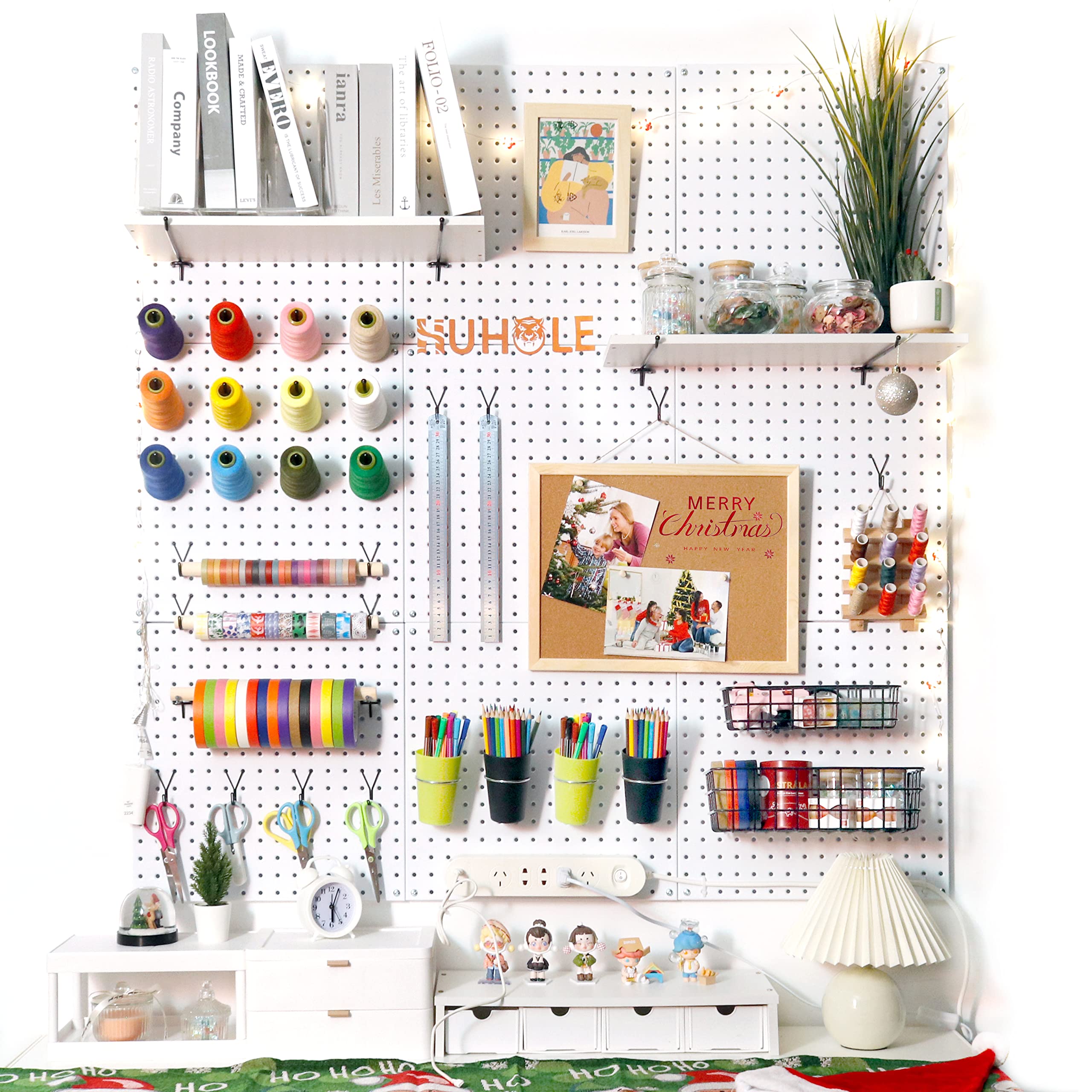 This image shows an extensively organized craft and sewing supply storage system using a pegboard panel with Huhole-style J-hooks. 