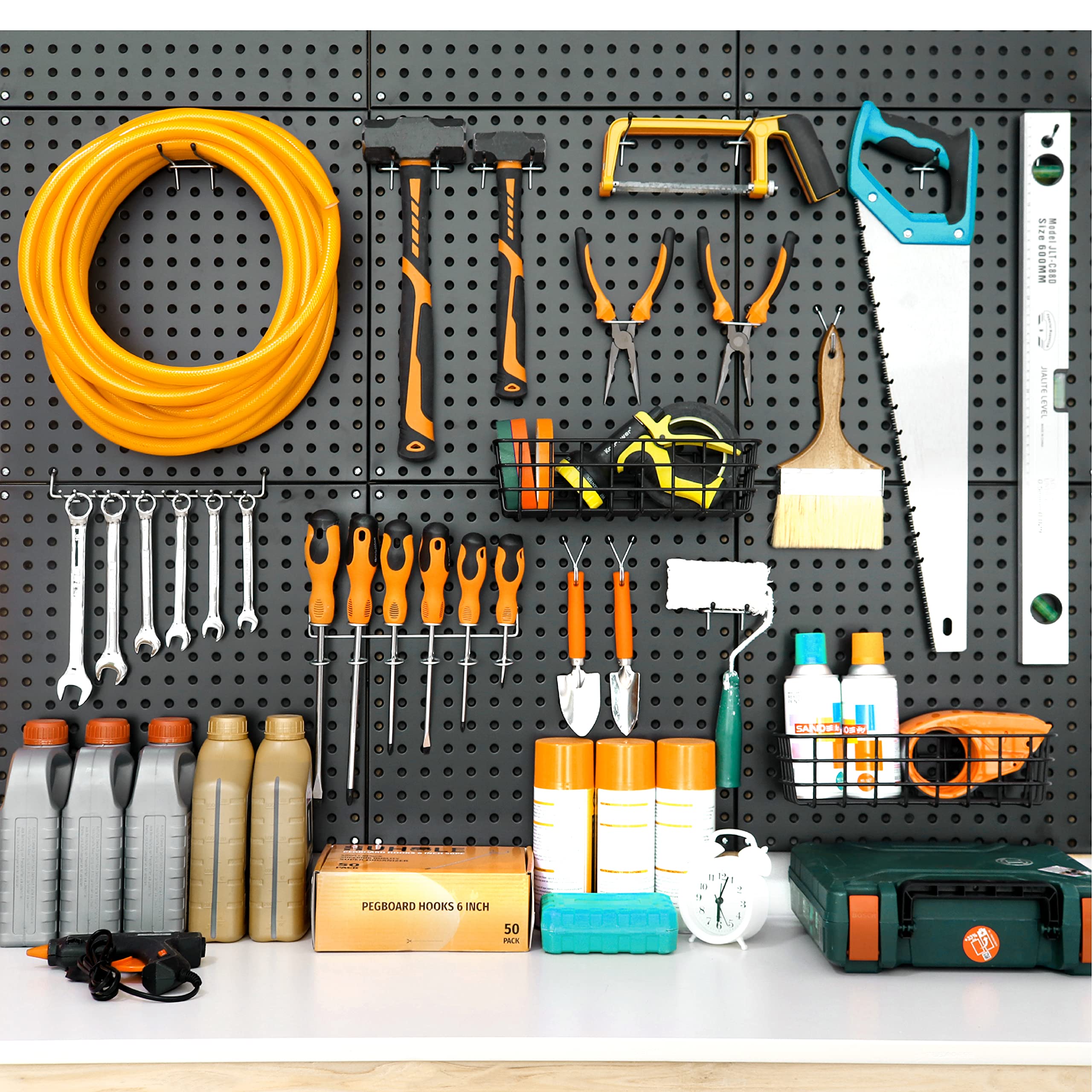 This image showcases a comprehensive and well-organized Huhole pegboard storage system, with a wide variety of tools, equipment, and accessories neatly displayed and accessible. 