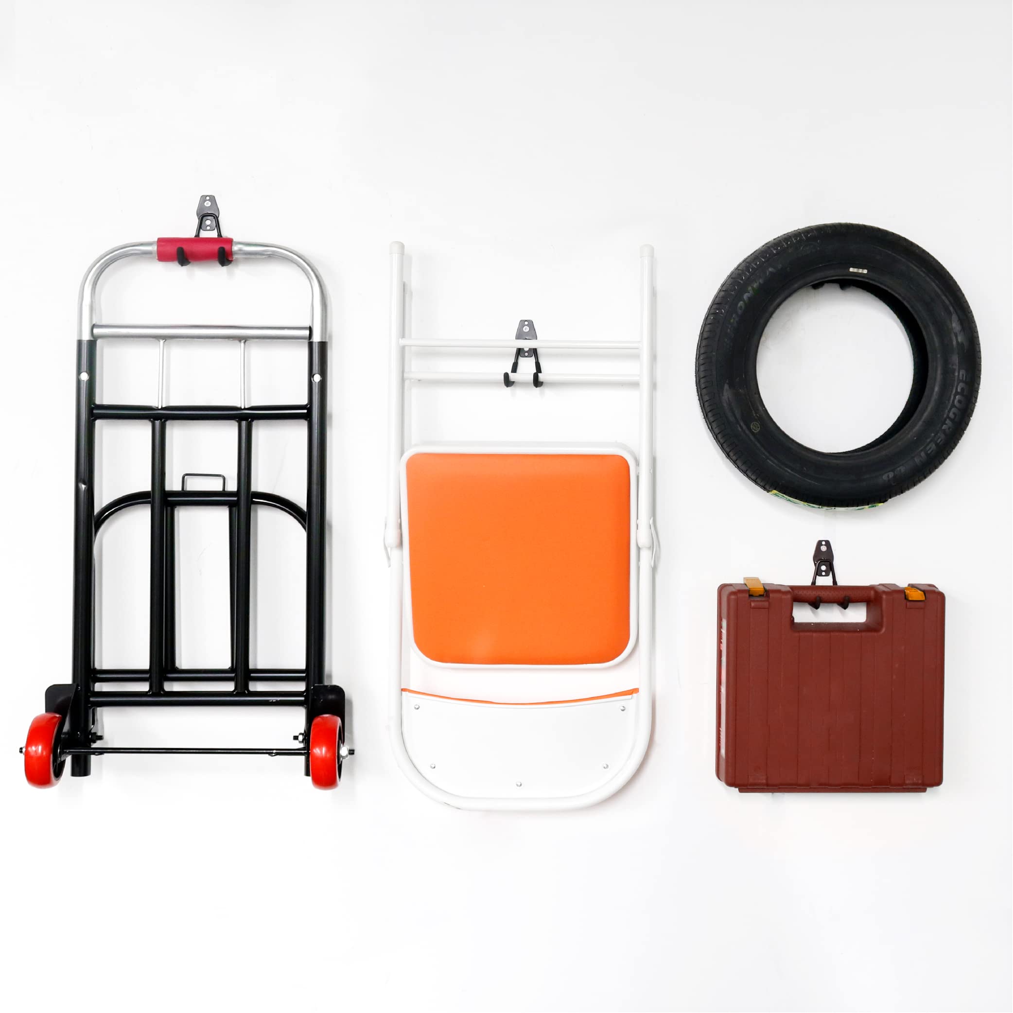 This image showcases a variety of garage storage accessories, including a rolling cart, a clear container, a binder, and a large rubber ring or tire. These items provide different organizational and storage solutions that can be utilized in a garage or workshop setting to keep various items neatly arranged and easily accessible.